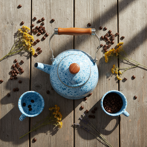 Basecamp enamel coffee kettle and mugs flat lay on rustic wood